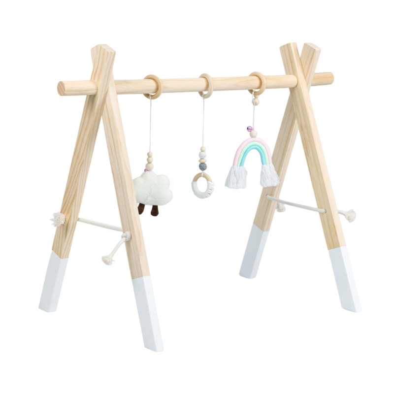 Hilft, die Verbindung zwischen Handbewegung und Sehsinn herzustellen Holz-Spielbogen für Kinder ab zwei Monaten